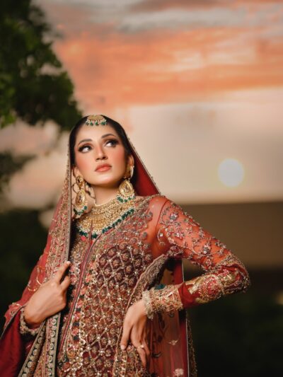 A beautiful woman in elaborate wedding attire.