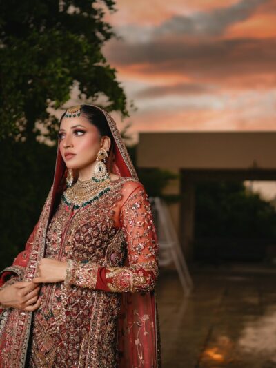 A bride poses in her wedding attire.