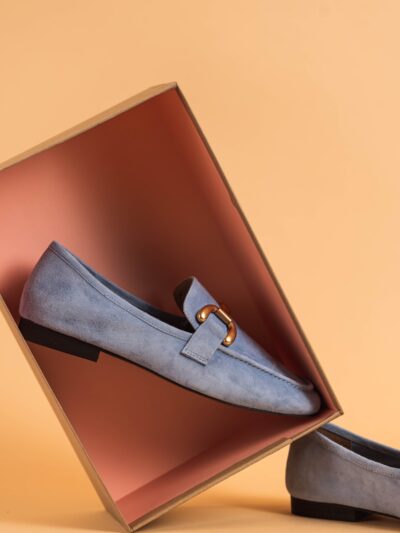 a pair of shoes sitting inside of a box