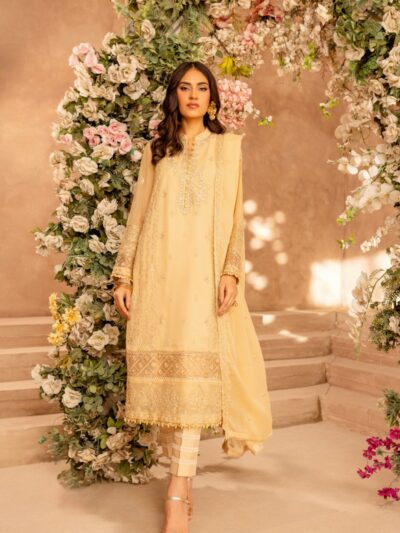 Photo by Shireen Lakdawala A woman standing in front of a floral arch
